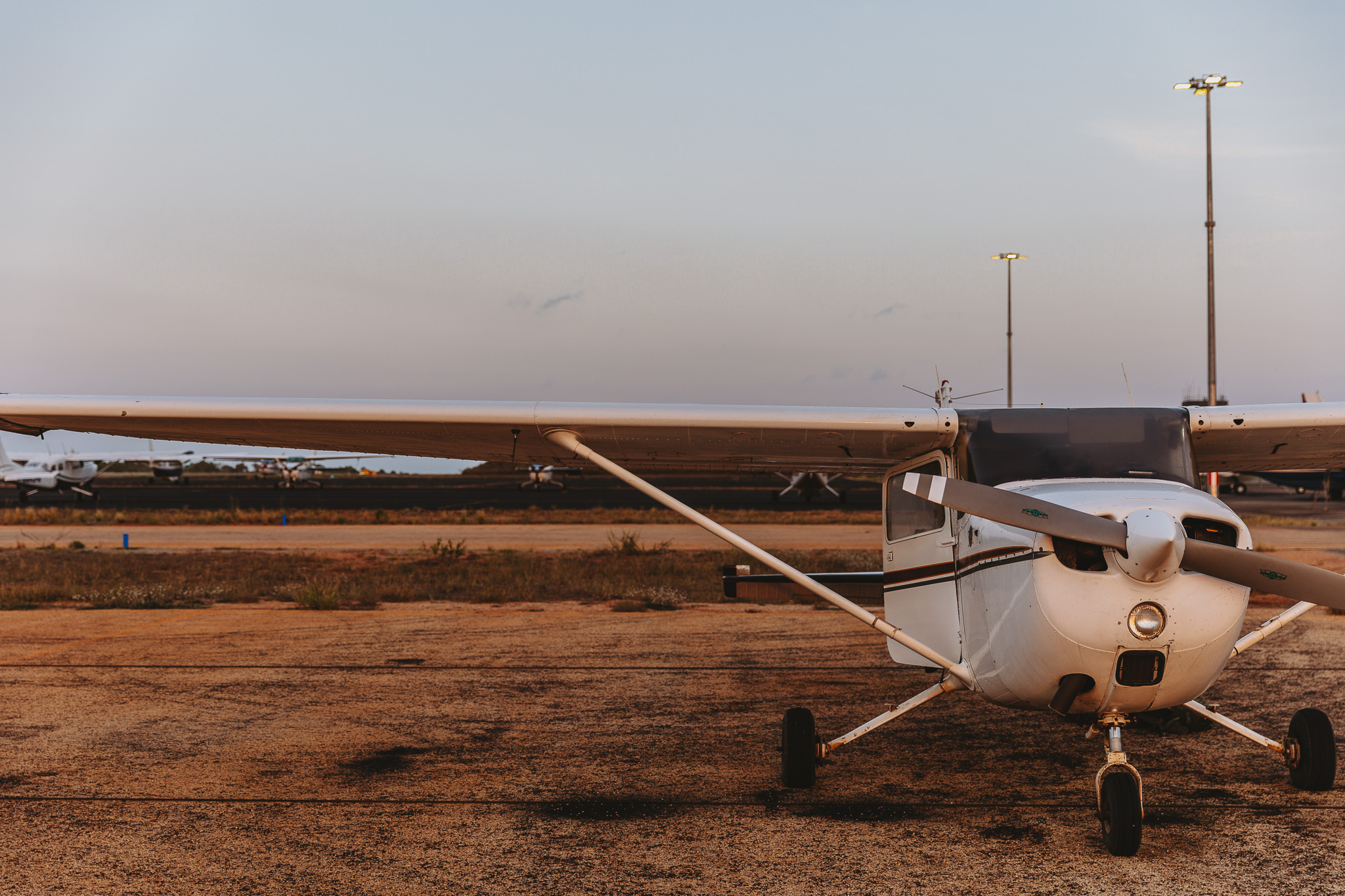 Cessna on ramp at golden hour