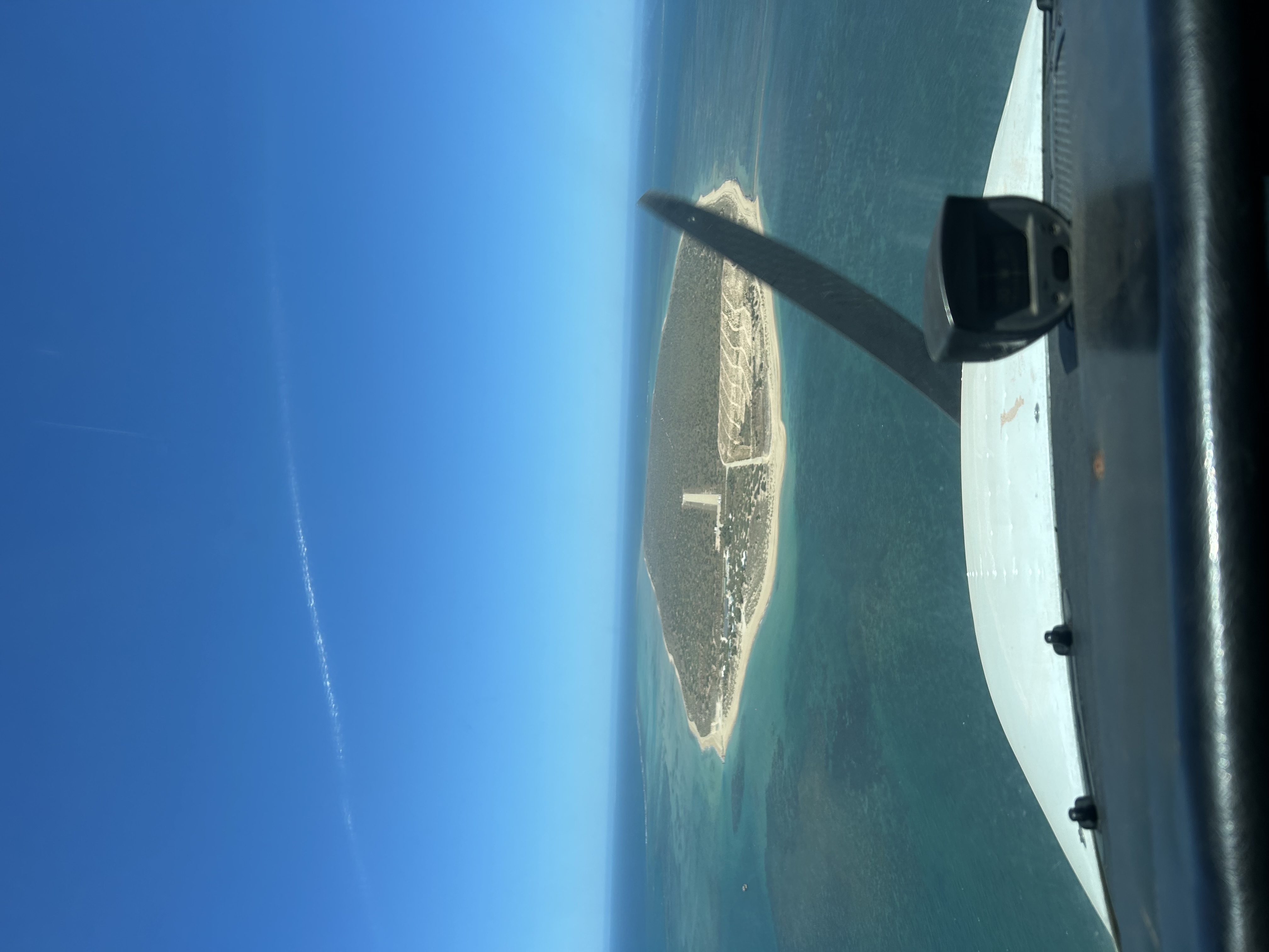 Approaching remote airstrip from cockpit
